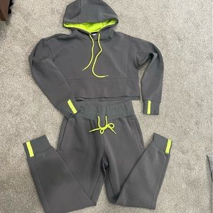 Women’s two piece leisure sweatsuit. Cropped sweatshirt medium, joggers large